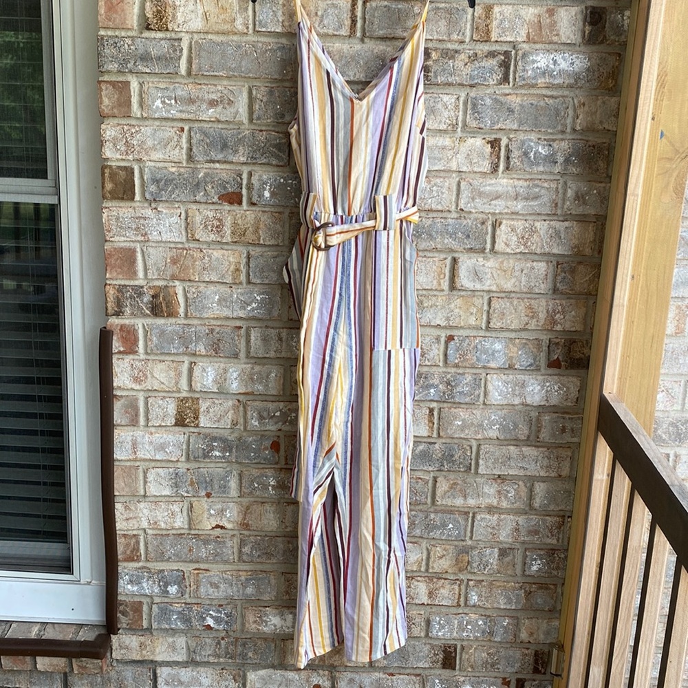 Beautiful striped jumpsuit with pockets and belt by blush boutique